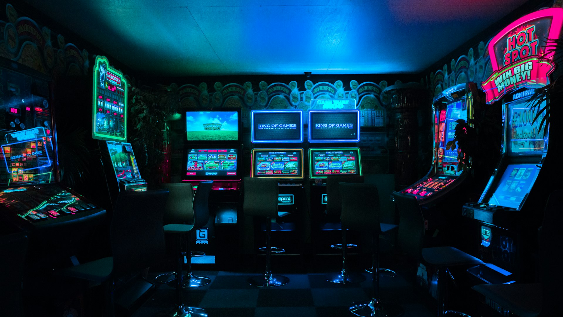 Carnival gaming arena under striped canopies